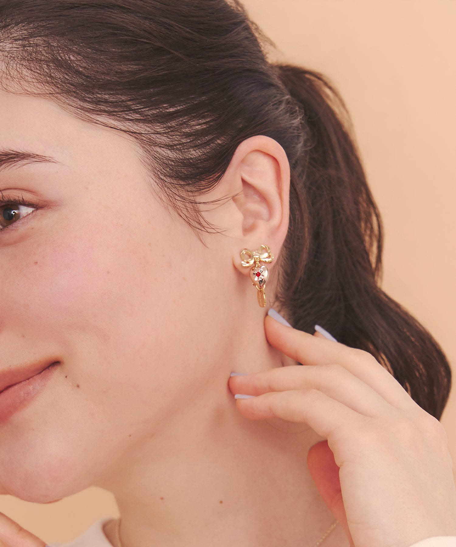 CKxLiquem イヤリング Love Notes