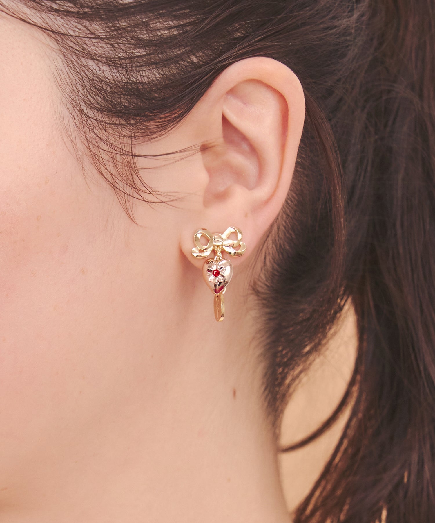 CKxLiquem イヤリング Love Notes